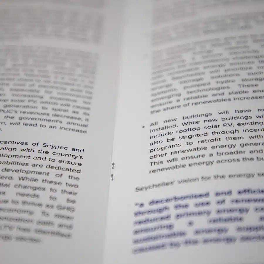 Open book with English text and bullet points.