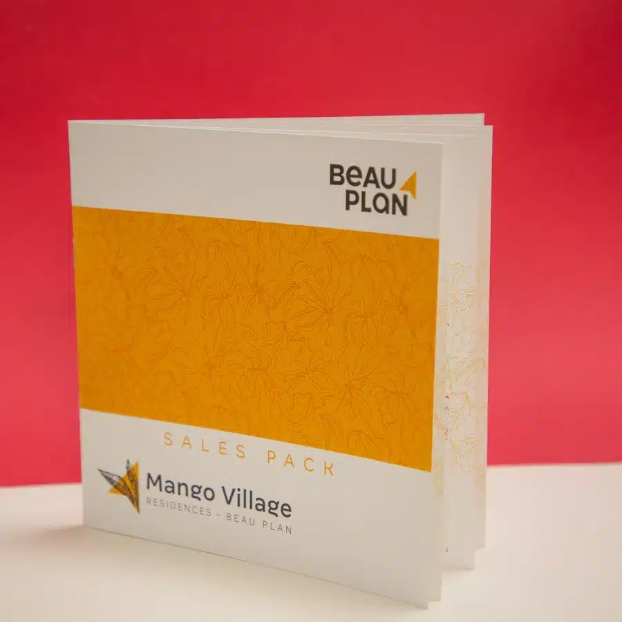 Mango Village sales pack brochure with orange cover